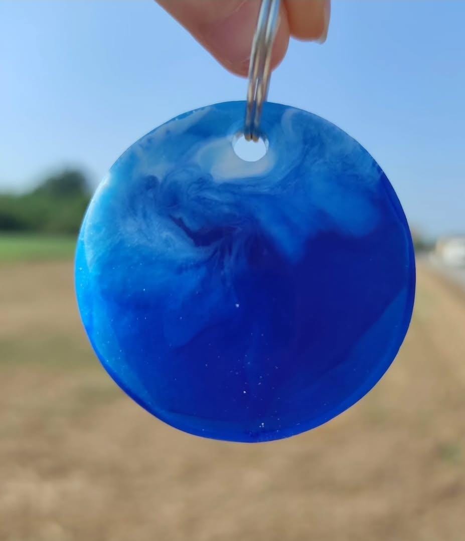 portachiavi, resina, resina epossidica, tondo, fiori secchi, mare, onde, onde mare, azzurro, bianco, keychain, regalo, battessimo, comunione, cresima, matrimonio, bomboniera, bomboniere